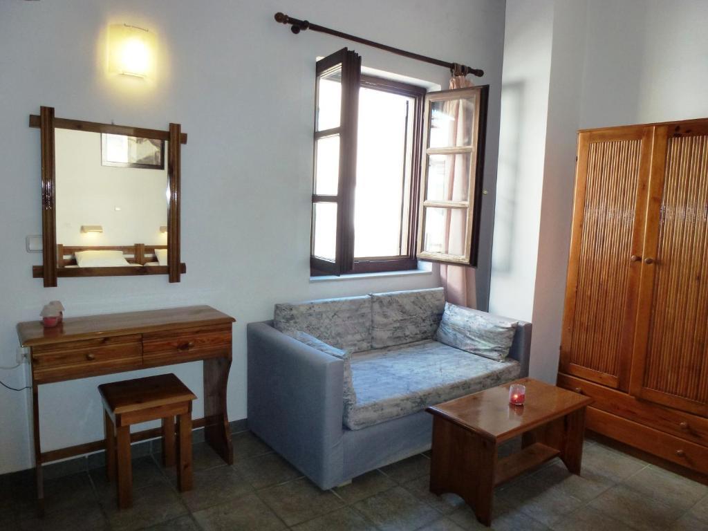 Aparthotel Odos Odysseos Ermoupoli Zimmer foto
