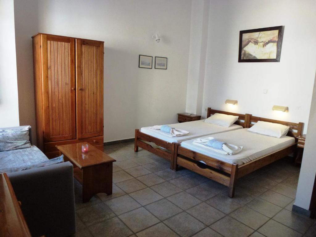 Aparthotel Odos Odysseos Ermoupoli Zimmer foto